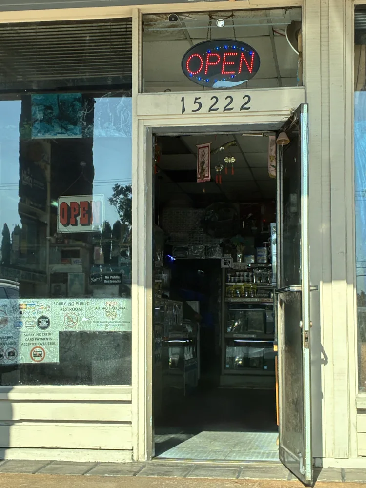 405 Tropical Fish entrance on Goldenwest Street, with 15222 above the door